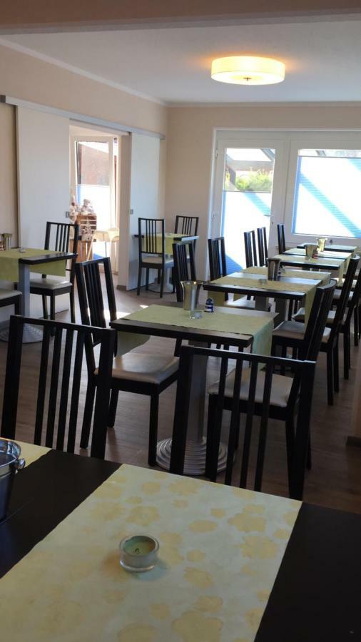 Hotel Pension Nordseewelle นอร์ดไดค์ ภายนอก รูปภาพ